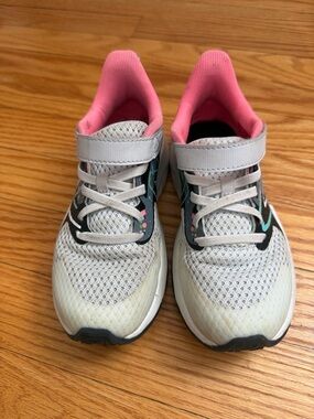New Balance Kids White and Pink Sneakers with Teal Accents